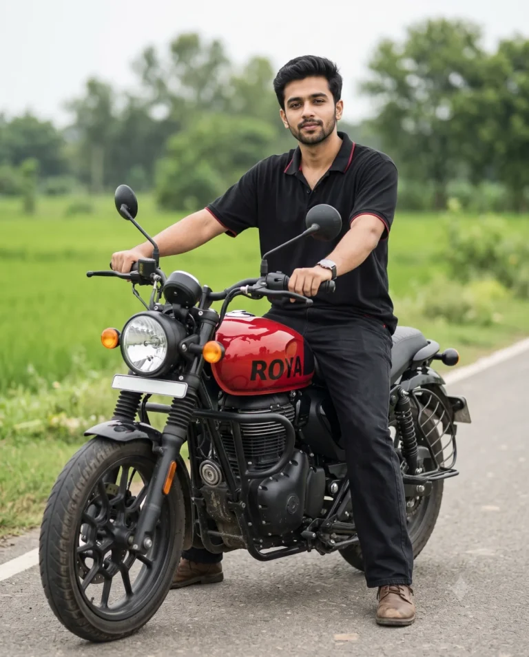 A young man seated on a red bike in a retro motorcycle portrait on a rural road.