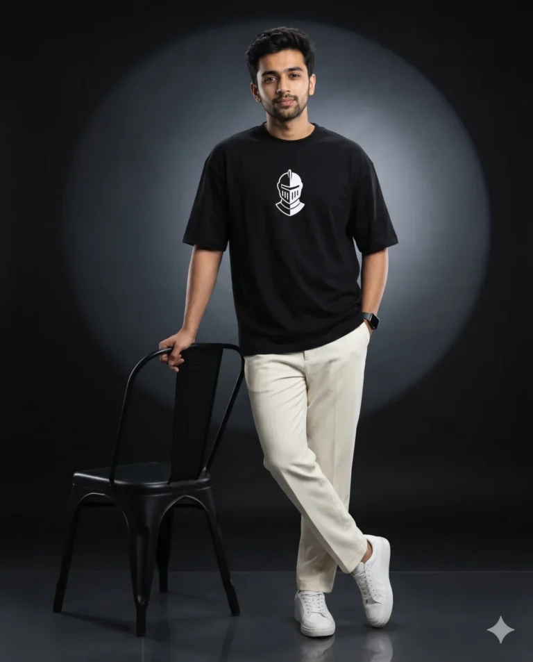 A handsome man in a black t-shirt and cream trousers created with a gemini studio prompt, featuring cinematic rim lighting.
