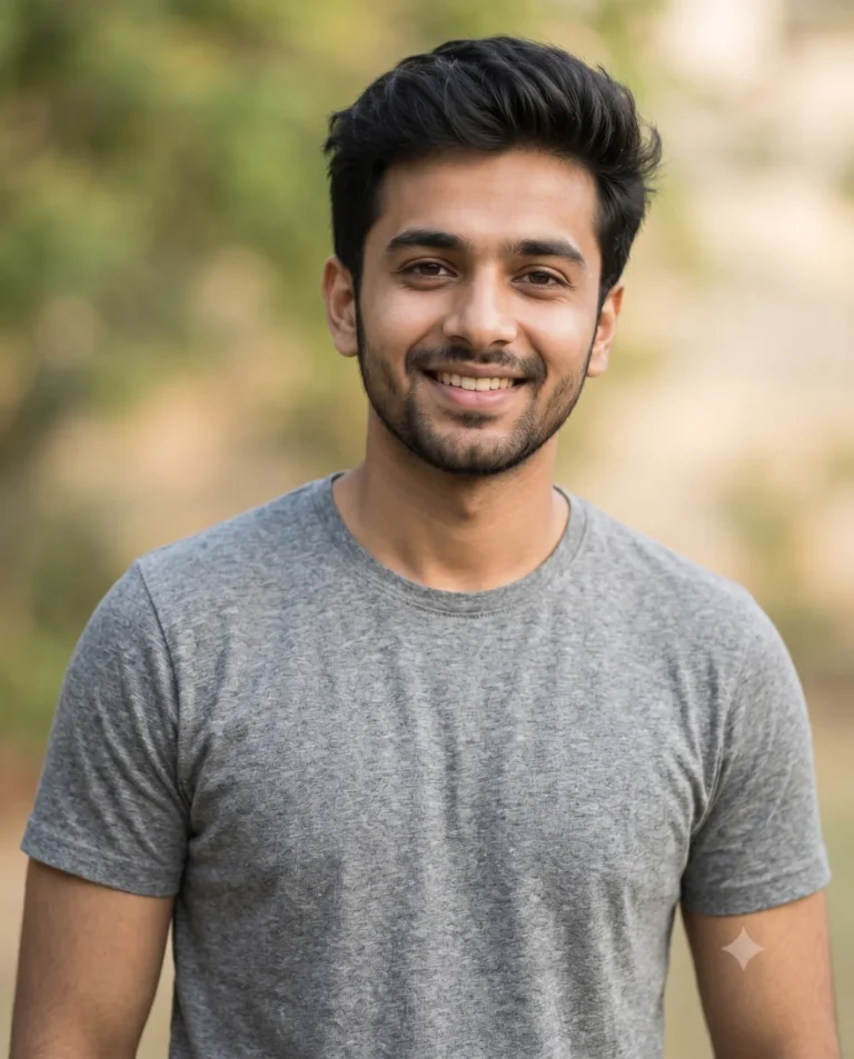 WhatsApp DP prompt generating a young man with a warm smile, wearing a gray t-shirt in soft outdoor lighting.